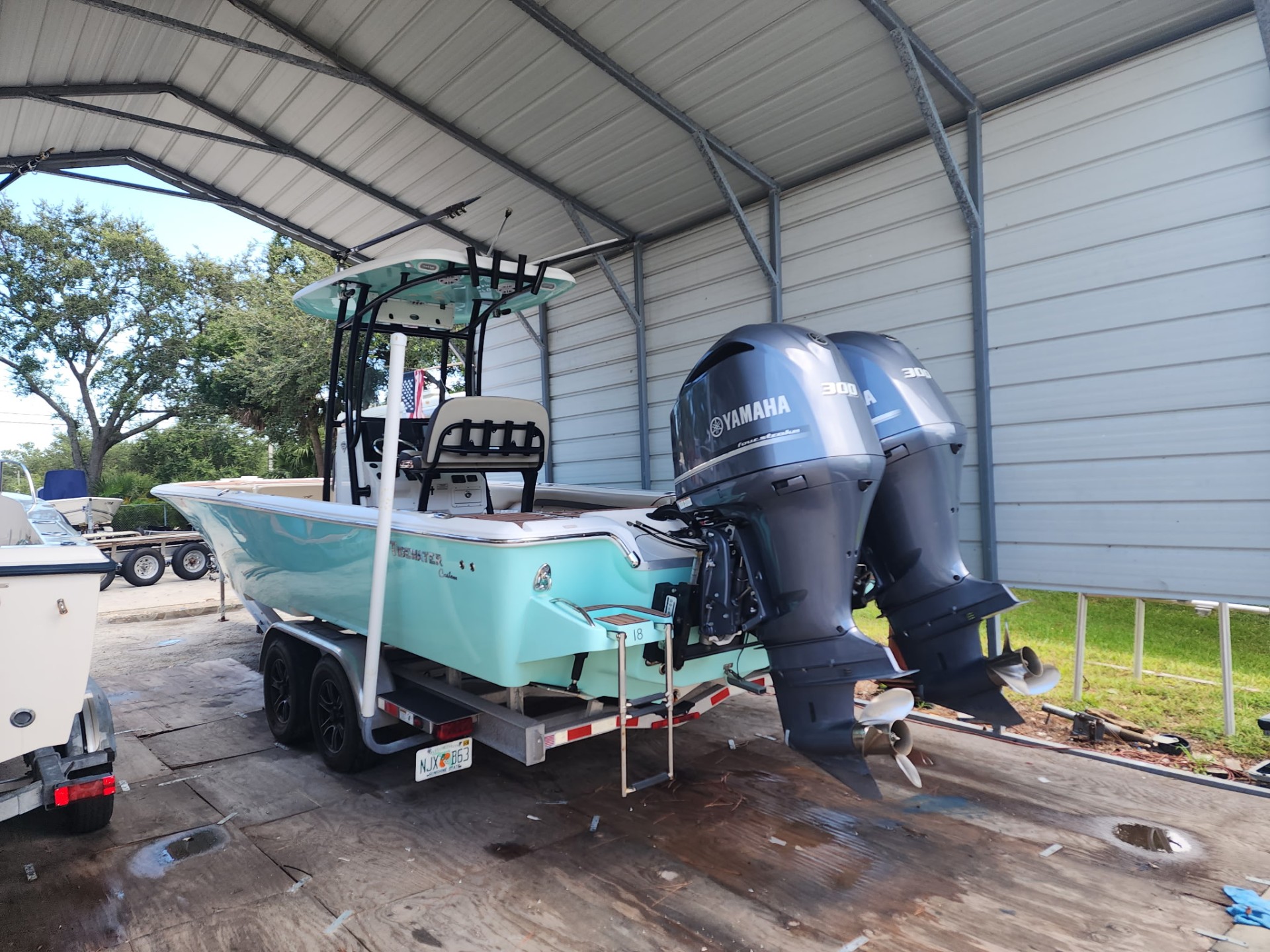 Twin Yamaha 300 outboards on a Tidewater center console